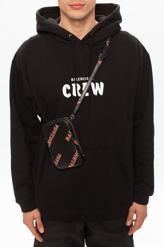 Balenciaga Black Calfskin Leather Sport Print Phone Holder Bag available at Queen Bee of Beverly Hills