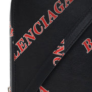 Balenciaga Black Calfskin Leather Sport Print Phone Holder Bag available at Queen Bee of Beverly Hills