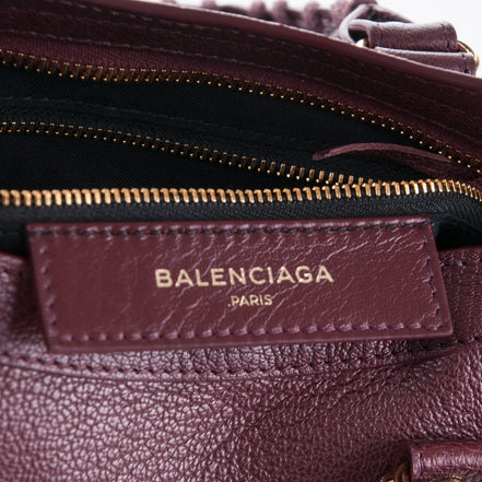 Balenciaga City Prune Purple Goat Leather Small Shoulder Bag available at Queen Bee of Beverly Hills