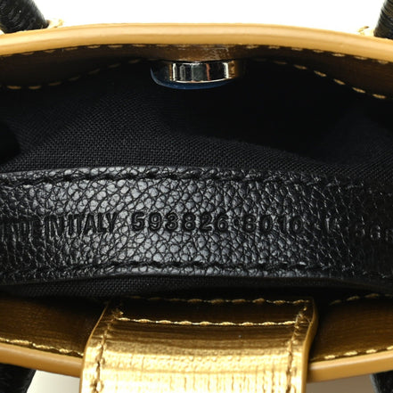 Balenciaga Gold Calfskin Leather Shopper Cross Body Bag available at Queen Bee of Beverly Hills