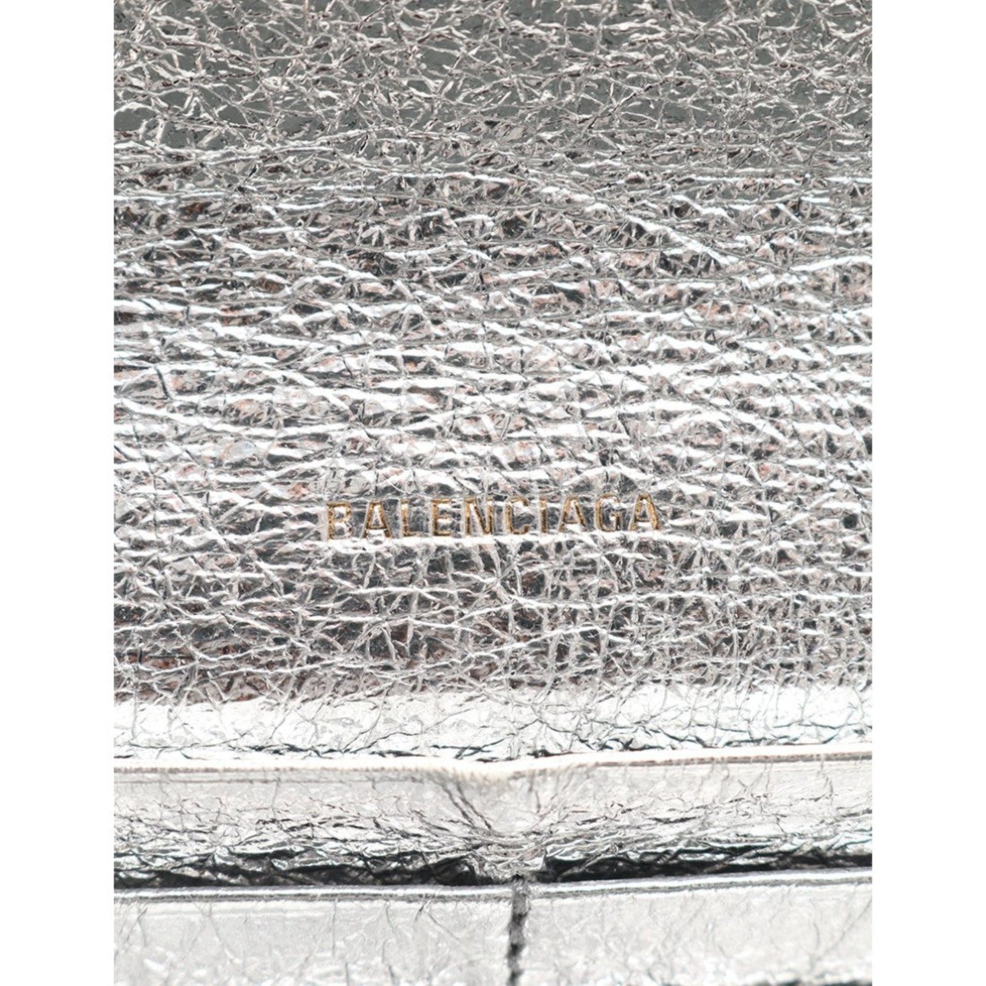 Balenciaga Papier Metallic Silver Arena Leather Envelope Wallet available at Queen Bee of Beverly Hills