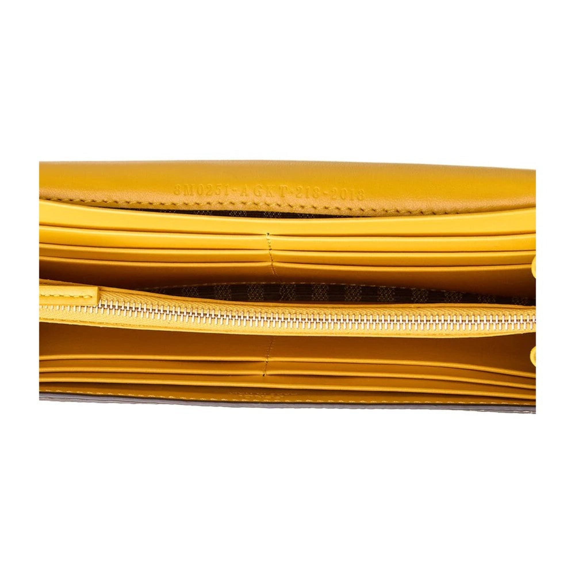 Fendi F is Fendi Yellow Leather Vertigo Print Long Wallet available at Queen Bee of Beverly Hills