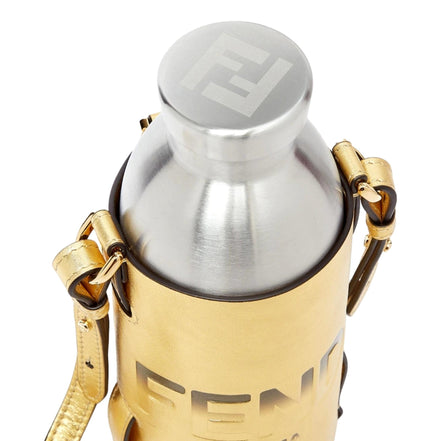 Fendi Roma Logo Steel Bottle and Gold Leather Holder Set available at Queen Bee of Beverly Hills