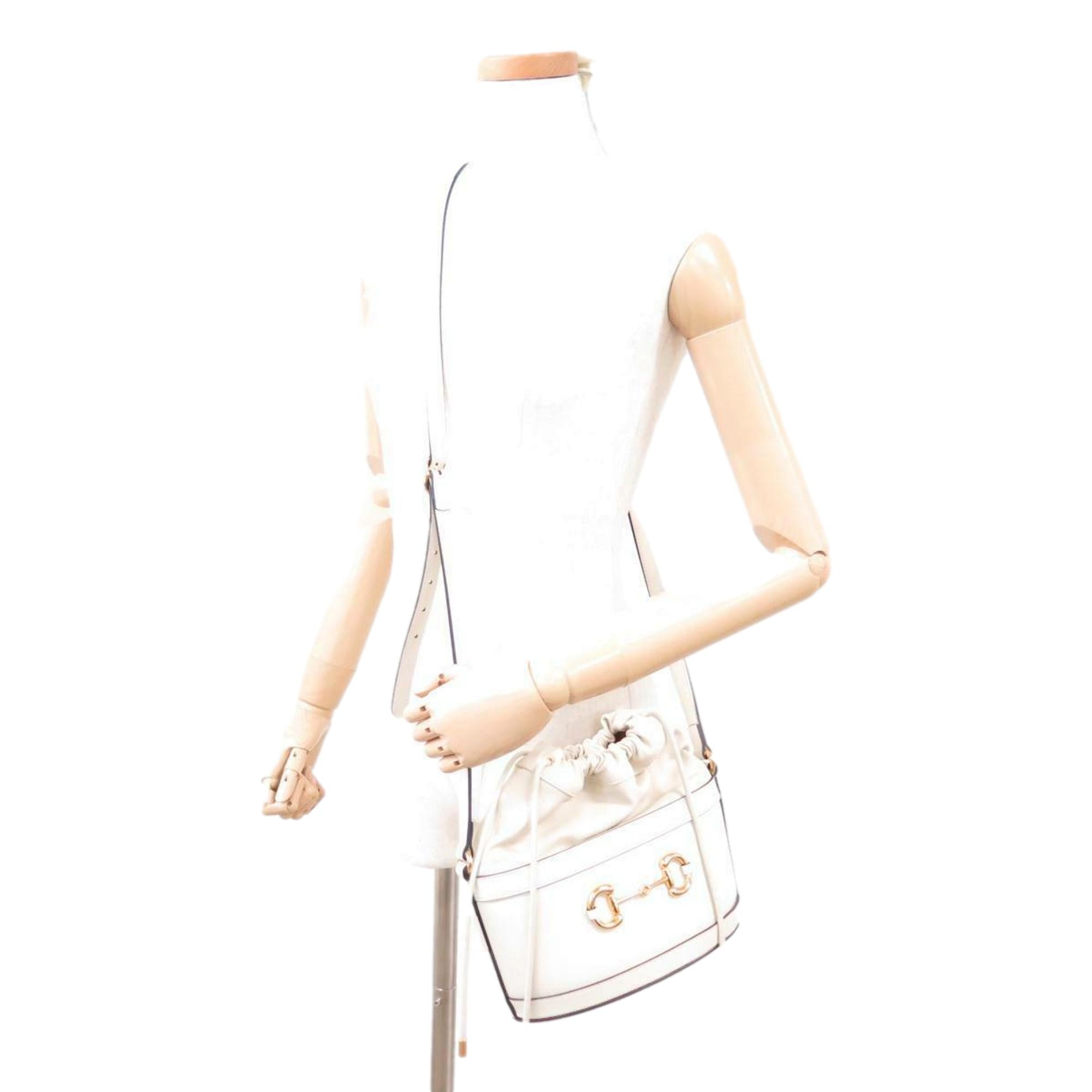 Gucci 1955 Horsebit White Leather Bucket Bag available at Queen Bee of Beverly Hills