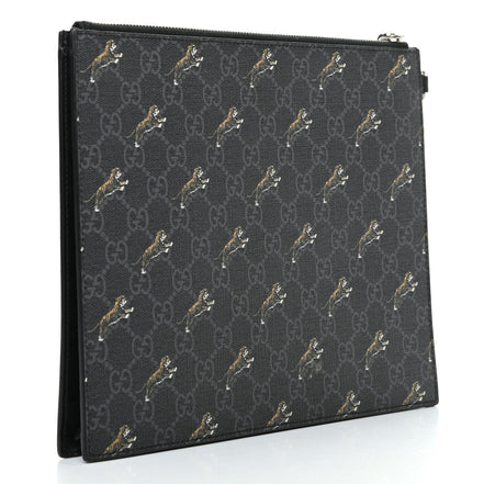 Gucci Black GG Supreme Monogram Tiger Print Clutch Bag available at Queen Bee of Beverly Hills