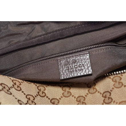 Gucci Large GG Logo Beige Canvas Brown Leather Strap Duffle Bag available at Queen Bee of Beverly Hills
