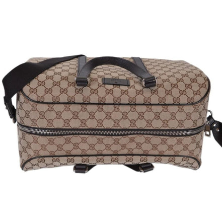 Gucci Large GG Logo Beige Canvas Brown Leather Strap Duffle Bag available at Queen Bee of Beverly Hills