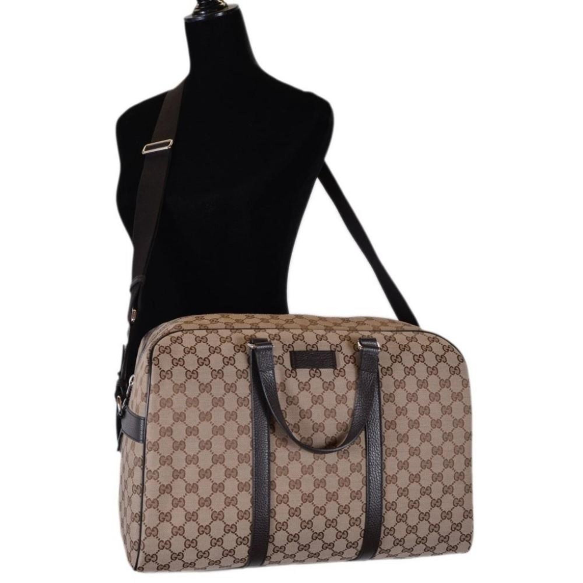 Gucci Large GG Logo Beige Canvas Brown Leather Strap Duffle Bag available at Queen Bee of Beverly Hills