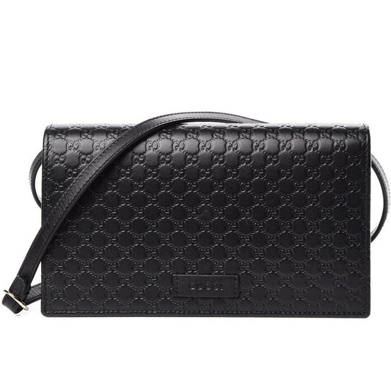 Gucci Microguccissima GG Logo Black Leather Wallet Crossbody Handbag available at Queen Bee of Beverly Hills