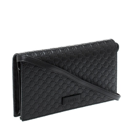 Gucci Microguccissima GG Logo Black Leather Wallet Crossbody Handbag available at Queen Bee of Beverly Hills