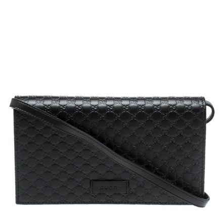 Gucci Microguccissima GG Logo Black Leather Wallet Crossbody Handbag available at Queen Bee of Beverly Hills