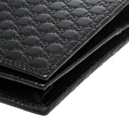 Gucci Microguccissima GG Logo Black Leather Wallet Crossbody Handbag available at Queen Bee of Beverly Hills