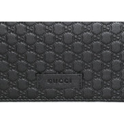 Gucci Microguccissima GG Logo Black Leather Wallet Crossbody Handbag available at Queen Bee of Beverly Hills