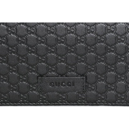 Gucci Microguccissima GG Logo Black Leather Wallet Crossbody Handbag available at Queen Bee of Beverly Hills