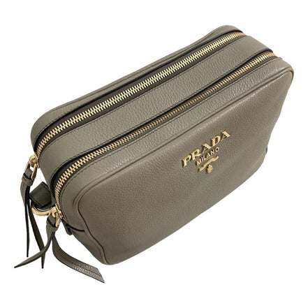 Prada Argilla Grey Vitello Phenix Leather Double Zip Cross Body Bag available at Queen Bee of Beverly Hills