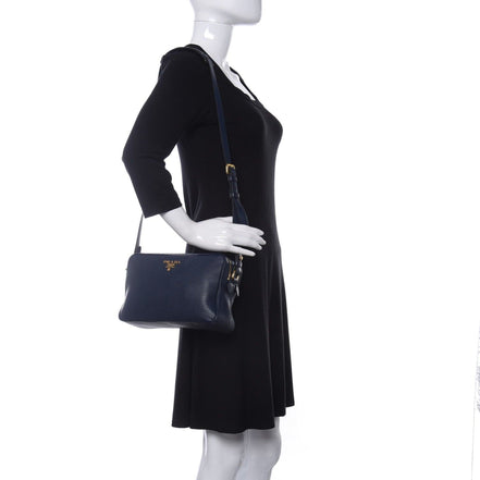 Prada Baltico Blue Vitello Phenix Leather Double Zip Crossbody Bag available at Queen Bee of Beverly Hills