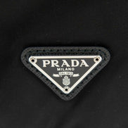 Prada Black Tessuto Nylon Triangle Logo Drawstring Bucket Bag available at Queen Bee of Beverly Hills