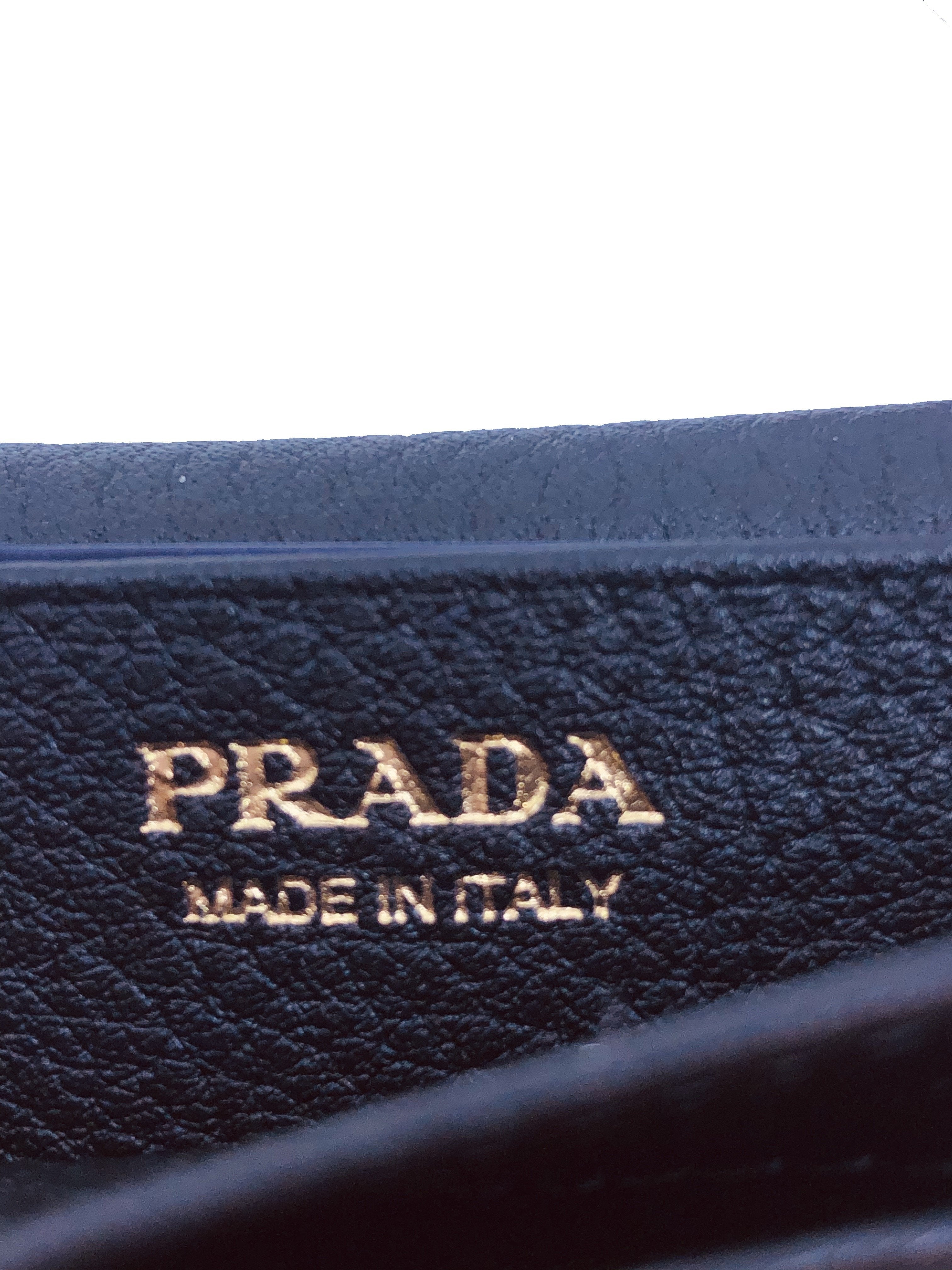 Prada Black Vitello Grain Soft Calf Leather Credit Card Case Wallet available at Queen Bee of Beverly Hills