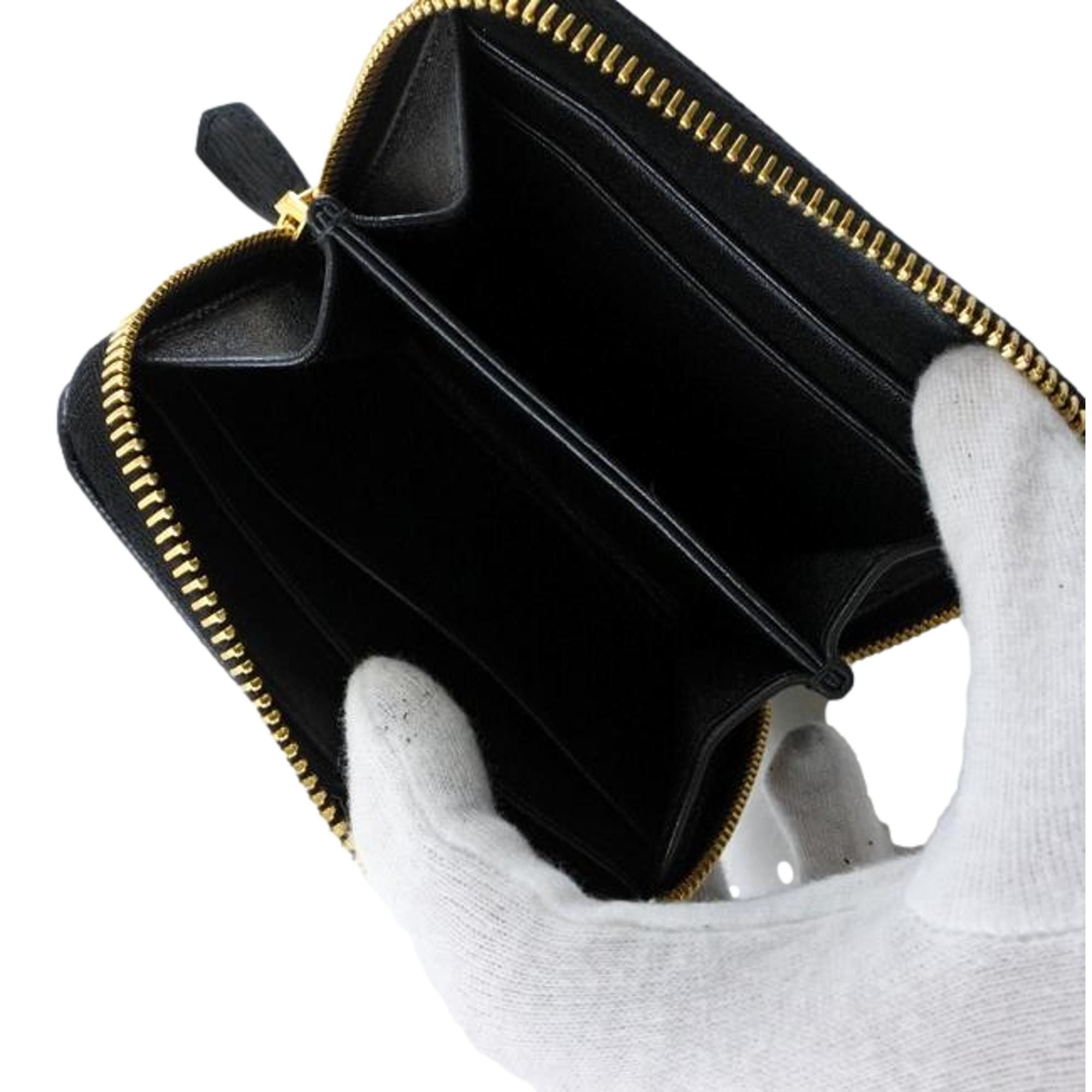 Prada Black Vitello Leather Gold Zip Coin Purse Wallet available at Queen Bee of Beverly Hills