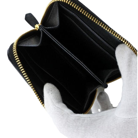Prada Black Vitello Leather Gold Zip Coin Purse Wallet available at Queen Bee of Beverly Hills