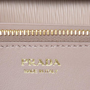 Prada Cipria Beige Vitello Move Leather Chain Wallet Crossbody available at Queen Bee of Beverly Hills
