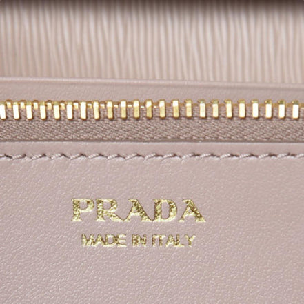 Prada Cipria Beige Vitello Move Leather Chain Wallet Crossbody available at Queen Bee of Beverly Hills