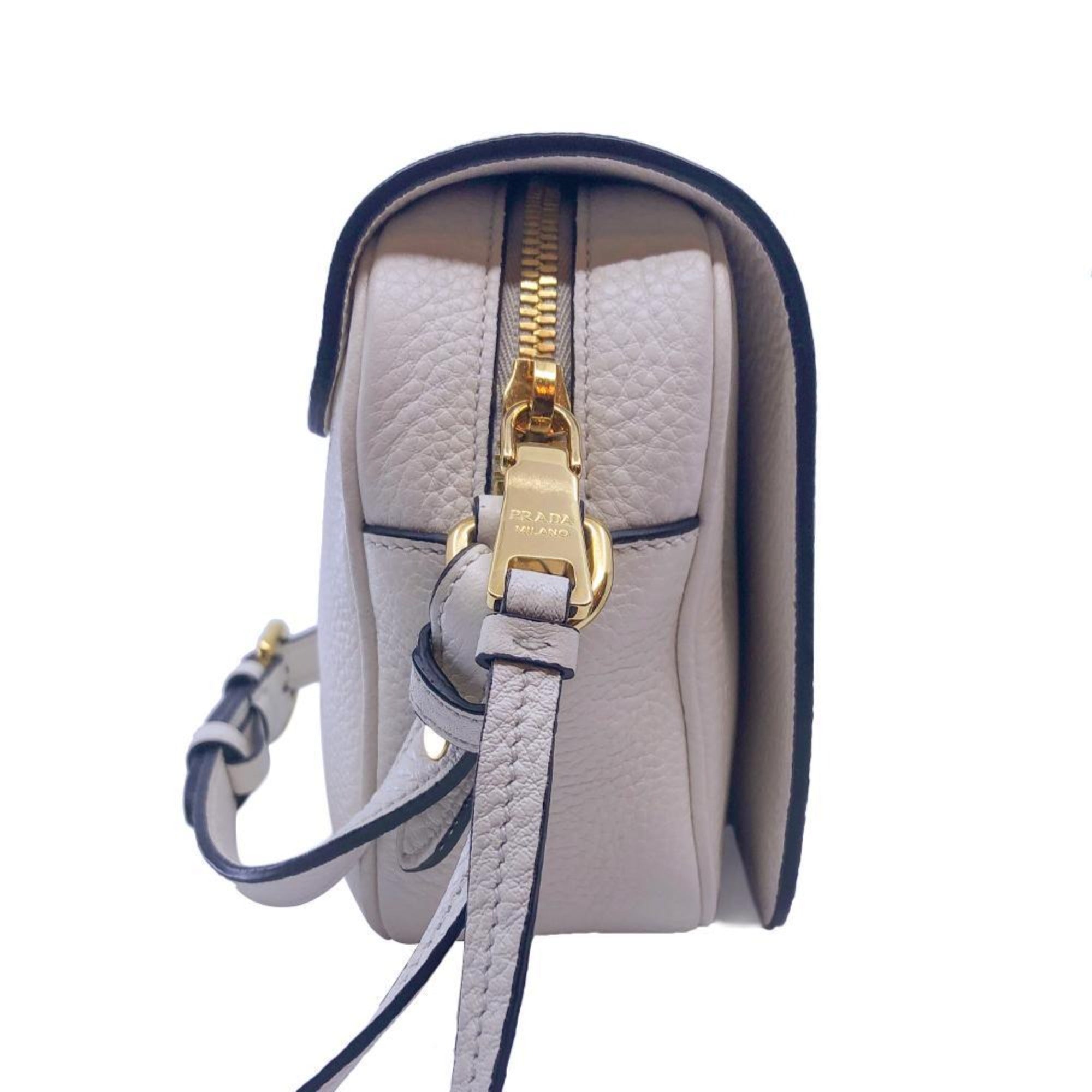 Prada Flap Vitello Phenix Ivory Leather Cross Body Bag available at Queen Bee of Beverly Hills