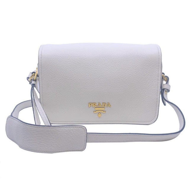 Prada Flap Vitello Phenix Ivory Leather Cross Body Bag available at Queen Bee of Beverly Hills