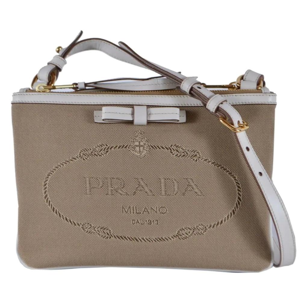 Prada Jacquard Canvas Brown Crossbody White Leather Trim Prada Logo 1BH150 at_Queen_Bee_of_Beverly_Hills