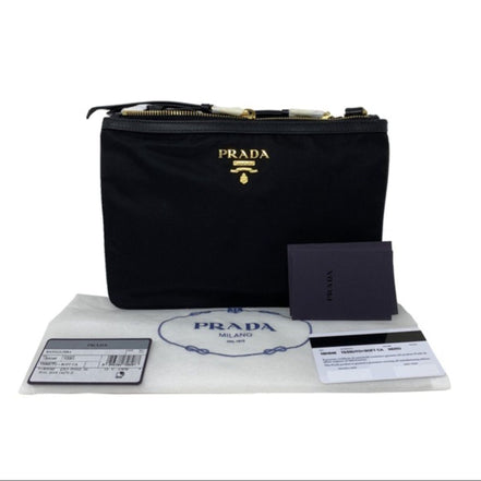 Prada Logo Tessuto Nylon Soft Calf Trim Black Cross Body Bag available at Queen Bee of Beverly Hills