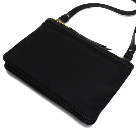 Prada Logo Tessuto Nylon Soft Calf Trim Black Cross Body Bag available at Queen Bee of Beverly Hills