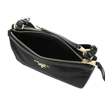 Prada Logo Tessuto Nylon Soft Calf Trim Black Cross Body Bag available at Queen Bee of Beverly Hills