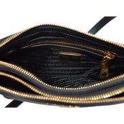 Prada Logo Tessuto Nylon Soft Calf Trim Black Cross Body Bag available at Queen Bee of Beverly Hills