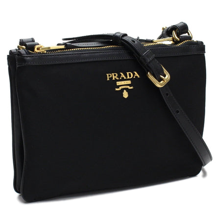 Prada Logo Tessuto Nylon Soft Calf Trim Black Cross Body Bag available at Queen Bee of Beverly Hills
