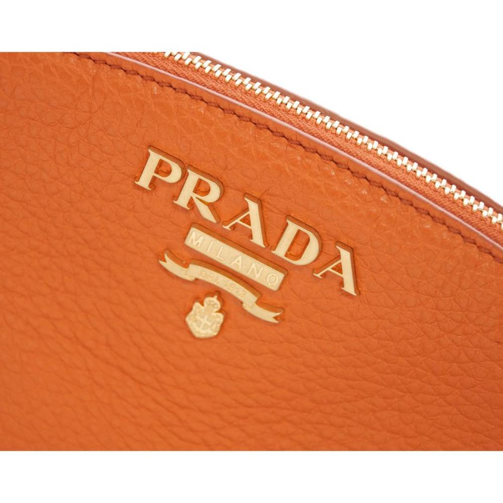 Prada // Orange Vitello Daino Double-Zip Camera Bag – VSP Consignment