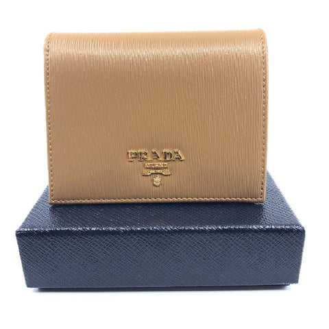 Prada Portafoglio Vertical Caramel Vitello Move Leather Flap Wallet 1MV204 at_Queen_Bee_of_Beverly_Hills