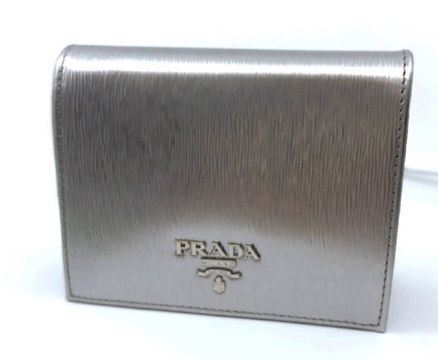 Prada Portafoglio Verticale Cromo Silver Vitello Move Leather Flap Wallet 1MV204 at_Queen_Bee_of_Beverly_Hills