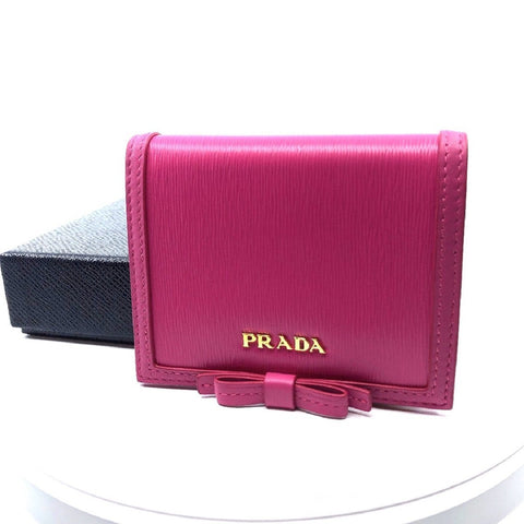 Prada Portafoglio Verticale Fuxia Pink Leather Vitello Move Flap Bow Wallet 1MV204 at_Queen_Bee_of_Beverly_Hills