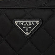 Prada Re-Edtion Nylon Quilted Black Triangle Logo Crossbody Bag available at Queen Bee of Beverly Hills