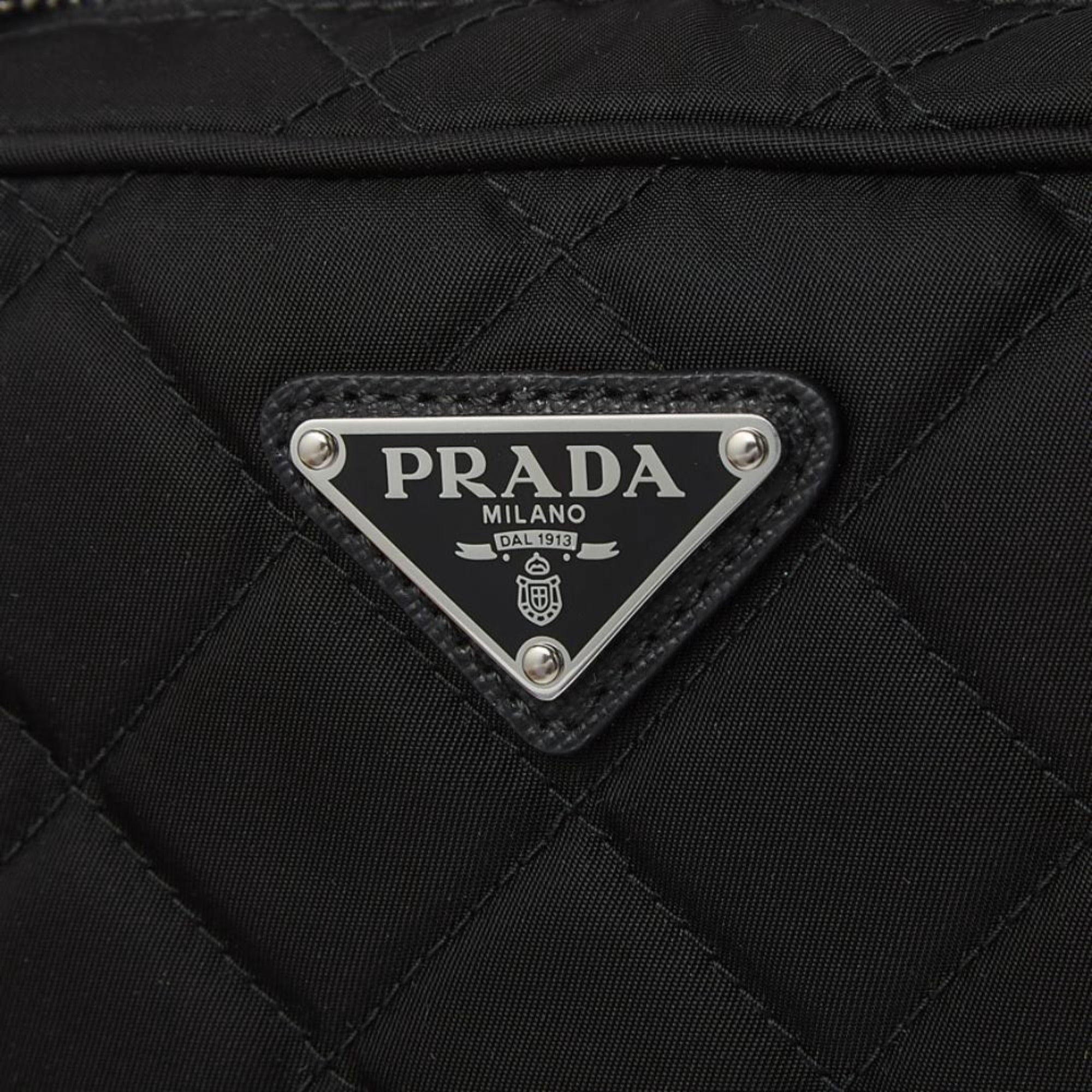 Prada Re-Edtion Nylon Quilted Black Triangle Logo Crossbody Bag available at Queen Bee of Beverly Hills