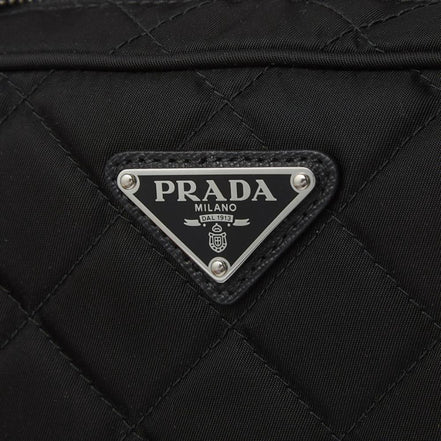 Prada Re-Edtion Nylon Quilted Black Triangle Logo Crossbody Bag available at Queen Bee of Beverly Hills
