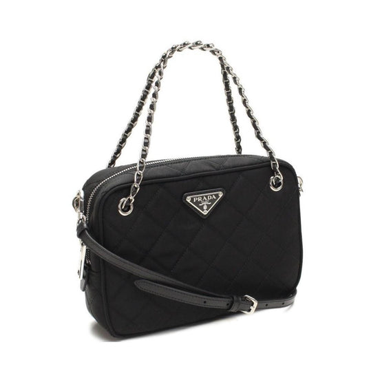 Prada Re-Edtion Nylon Quilted Black Triangle Logo Crossbody Bag available at Queen Bee of Beverly Hills