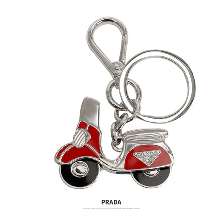 Prada Rosso Red Metal Vespa Scooter Keychain available at Queen Bee of Beverly Hills