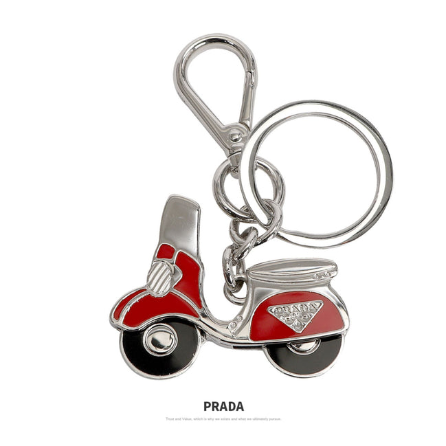Prada Rosso Red Metal Vespa Scooter Keychain available at Queen Bee of Beverly Hills
