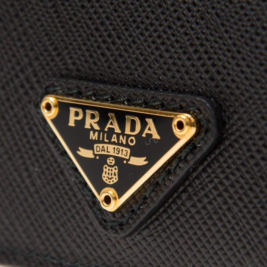 Shop PRADA Saffiano leather card holder (1MC085_QHH_F0458
