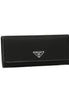 Prada Tessuto Nero Black Continental Flap Black Wallet Silver Triangle Logo available at Queen Bee of Beverly Hills