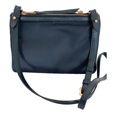 Prada Tessuto Nylon Blue Zip Calf Leather Cross Body Bag available at Queen Bee of Beverly Hills