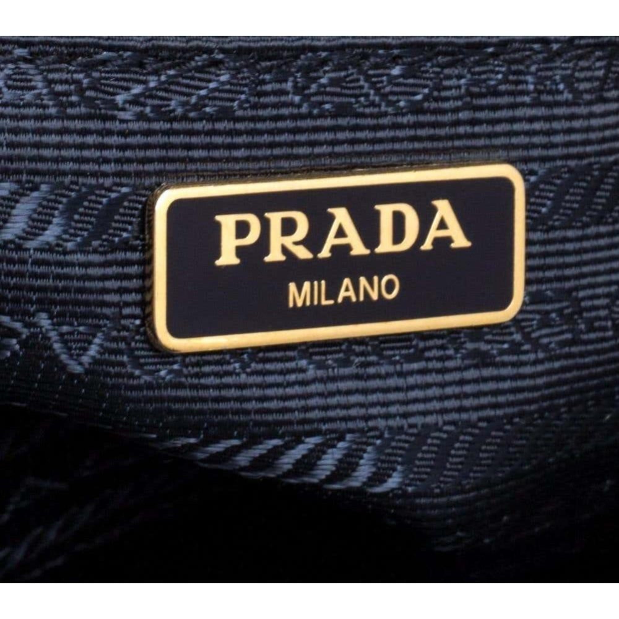 Prada Tessuto Nylon Blue Zip Calf Leather Cross Body Bag available at Queen Bee of Beverly Hills
