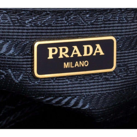 Prada Tessuto Nylon Blue Zip Calf Leather Cross Body Bag available at Queen Bee of Beverly Hills