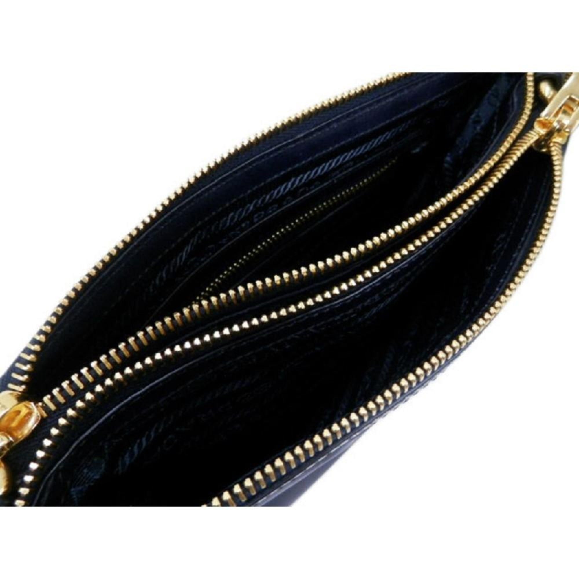 Prada Tessuto Nylon Blue Zip Calf Leather Cross Body Bag available at Queen Bee of Beverly Hills